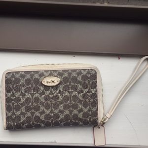 Coach tan wallet with red interior